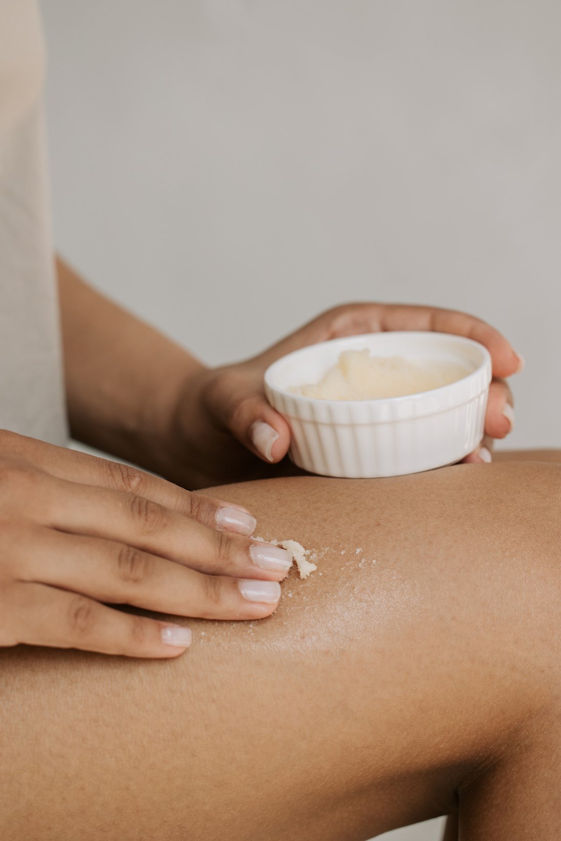 Woman Applying Homemade Scrub on Skin